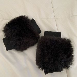 Furry black handwarmers